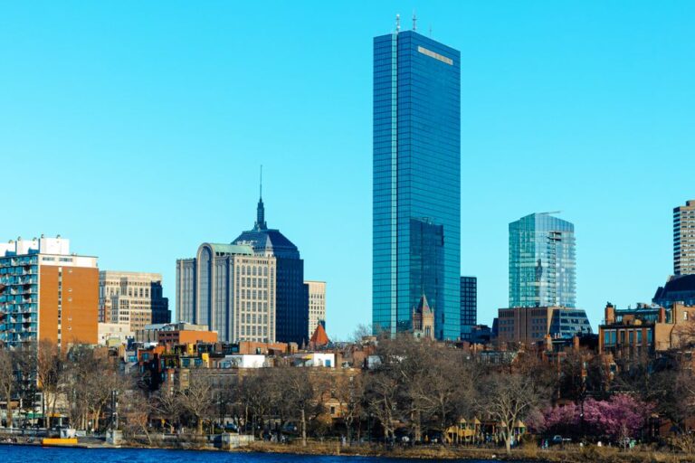 Stunning view of Boston's skyline featuring the iconic John Hancock Tower and modern architecture.